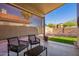 Covered patio area with outdoor seating, perfect for relaxing and entertaining at 4515 E Verbena Dr, Phoenix, AZ 85044