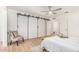 Large bedroom boasts modern closet doors, a ceiling fan, and neutral decor at 5333 E Sheena Dr, Scottsdale, AZ 85254