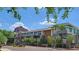 Modern condo complex with desert landscaping featuring a view of Camelback mountain in Scottsdale, AZ at 5455 E Lincoln Dr # 1004, Paradise Valley, AZ 85253