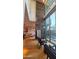 Spacious living area featuring floor-to-ceiling windows, modern furniture, and access to the outdoor patio at 5455 E Lincoln Dr # 1004, Paradise Valley, AZ 85253