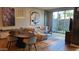 Bright living room featuring modern decor, neutral tones, and an open floor plan with a view to the patio at 5455 E Lincoln Dr # 1004, Paradise Valley, AZ 85253