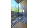 Modern outdoor patio with sleek dining set, xeriscaping and privacy walls at 5455 E Lincoln Dr # 1004, Paradise Valley, AZ 85253