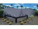 The Mountain Shadows community entrance features cacti, desert landscaping, and clean modern architecture at 5455 E Lincoln Dr # 1004, Paradise Valley, AZ 85253