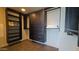Spacious walk-in closet featuring dark cabinets, drawers, shelving, and ample storage at 5455 E Lincoln Dr # 1004, Paradise Valley, AZ 85253