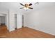 Bright and airy bedroom with spacious closet and wood laminate floors at 5860 W Saragosa St, Chandler, AZ 85226