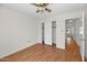 Bright bedroom boasts closet storage and laminate flooring, offering a practical and inviting space at 5860 W Saragosa St, Chandler, AZ 85226