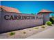 Carrington Place community entrance sign with desert landscaping and blue sky at 5860 W Saragosa St, Chandler, AZ 85226