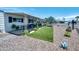 Charming front yard with gravel, plants, artificial turf and furniture on the porch of a cozy home at 632 S 83Rd Way, Mesa, AZ 85208