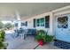 Welcoming front porch with seating area perfect for relaxing outdoors at 632 S 83Rd Way, Mesa, AZ 85208