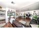 Spacious living room featuring hardwood floors and seamless access to the kitchen and dining area at 632 S 83Rd Way, Mesa, AZ 85208