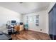 Inviting office space featuring wood floors, natural light, and ample desk space at 632 S 83Rd Way, Mesa, AZ 85208