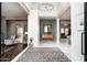 Grand foyer featuring soaring ceilings, elegant lighting, and a view into multiple living spaces at 8601 E De La O Rd, Scottsdale, AZ 85255