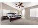 This spacious bedroom features vaulted ceilings, and an ensuite bathroom at 8875 S Ash Ave, Tempe, AZ 85284