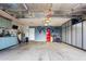 Spacious garage with built-in cabinets, bikes, and ample storage space at 8875 S Ash Ave, Tempe, AZ 85284