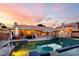 Private backyard with a sparkling pool and patio area perfect for relaxing and entertaining at 8875 S Ash Ave, Tempe, AZ 85284