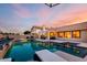 Relaxing pool area with lounge chairs and a view of the patio offers a refreshing outdoor space at 8875 S Ash Ave, Tempe, AZ 85284