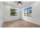 Bright bedroom with hardwood floors and large windows offer great natural light at 9820 N 87Th Pl, Scottsdale, AZ 85258