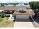 Charming single-story home with a two-car garage and solar panels on the roof in a quiet neighborhood at 10236 N 105Th Dr, Sun City, AZ 85351