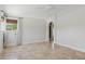 Bright, empty bedroom with tile flooring, ceiling fan, and window to provide natural light at 10450 E Terra Dr, Scottsdale, AZ 85258