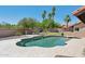 Inviting backyard oasis featuring a private pool, putting green, and lush landscaping at 10450 E Terra Dr, Scottsdale, AZ 85258