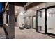 Charming entrance featuring an outdoor sitting area with stylish furniture and gray brick accents at 11007 N 26Th St, Phoenix, AZ 85028