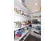 Walk-in pantry with an abundance of shelving offering lots of storage space for food and drinks at 11007 N 26Th St, Phoenix, AZ 85028