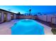 Inviting pool with tiled trim and concrete surround, offering a refreshing oasis for relaxation and outdoor enjoyment at 11007 N 26Th St, Phoenix, AZ 85028