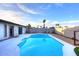 Sparkling in-ground swimming pool surrounded by a white concrete patio at 11007 N 26Th St, Phoenix, AZ 85028