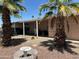 Exterior view of single story home showing covered carport and mature landscaping at 11411 N 91St Ave # 229, Peoria, AZ 85345