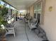 Spacious covered patio with comfortable seating, perfect for outdoor relaxation at 11411 N 91St Ave # 229, Peoria, AZ 85345