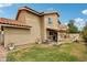 Large backyard featuring a covered patio and spacious grass at 1344 N Brittany Ln, Gilbert, AZ 85233