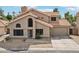 Charming two-story home featuring a well-maintained yard and a classic tile roof at 1344 N Brittany Ln, Gilbert, AZ 85233