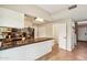 Kitchen featuring tile floors, updated appliances, and access to the pantry at 1344 N Brittany Ln, Gilbert, AZ 85233