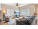 Comfortable living room features neutral tones, plush seating, and lots of natural light at 1344 N Brittany Ln, Gilbert, AZ 85233