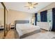 A relaxing main bedroom featuring neutral decor, large bed, and ample closet space at 1344 N Brittany Ln, Gilbert, AZ 85233