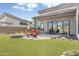 This modern backyard features synthetic grass, fire pit and unobstructed mountain views at 14507 N Valencia Dr, Fountain Hills, AZ 85268