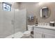 Elegant bathroom featuring a glass shower, stained glass, quartz countertop and modern fixtures at 14507 N Valencia Dr, Fountain Hills, AZ 85268