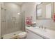 Bathroom featuring a large walk-in shower, white vanity with quartz countertops and decorative accents at 14507 N Valencia Dr, Fountain Hills, AZ 85268