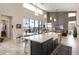 Spacious kitchen with a large island, stainless steel appliances, and a view of the dining area at 14507 N Valencia Dr, Fountain Hills, AZ 85268