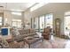 Open-concept living room with tall ceilings and seamless access to the outdoor living area at 14507 N Valencia Dr, Fountain Hills, AZ 85268