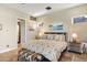 Cozy bedroom features a comfortable bed, neutral tones, and natural light creating a serene and inviting space at 14507 N Valencia Dr, Fountain Hills, AZ 85268