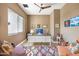 Inviting home office features a well-lit desk, a comfortable seating area, and decor creating a productive workspace at 14507 N Valencia Dr, Fountain Hills, AZ 85268