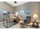 Stylish home office with a modern desk, leather chair and ample natural light at 14507 N Valencia Dr, Fountain Hills, AZ 85268