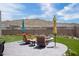 Inviting patio area with comfortable seating and a fire pit, perfect for outdoor entertaining against a mountain backdrop at 14507 N Valencia Dr, Fountain Hills, AZ 85268