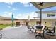 This open patio features stylish pavers, a dining table and plenty of space for entertaining at 14507 N Valencia Dr, Fountain Hills, AZ 85268
