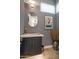 Chic powder room features a stylish vanity, designer mirror, and elegant decor, adding a touch of sophistication at 14507 N Valencia Dr, Fountain Hills, AZ 85268