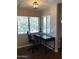Bright office space with a desk, chair, and natural light, perfect for a productive work environment at 15252 N 100Th St # 2157, Scottsdale, AZ 85260