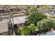 Overhead view of house with mature trees, covered parking, and neighborhood landscape at 1541 E Cinnabar Ave, Phoenix, AZ 85020