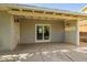 Covered back patio offers a peaceful retreat with access to backyard at 1541 E Cinnabar Ave, Phoenix, AZ 85020