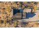 Unique home featuring a well-maintained yard with mature trees and landscaping at 15612 S Tuthill Rd, Buckeye, AZ 85326